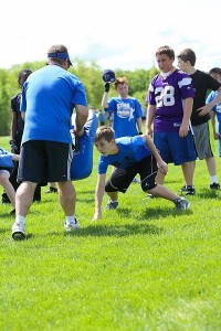 Spring campers work on football fundamentals at the STMA Football Academy. (Courtesy STMA Football Academy)