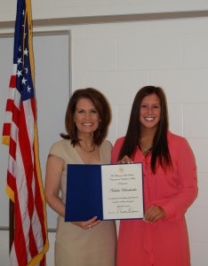 Rep. Michele Bachmann presents a Congressional Certificate of Merit to Natialia Valenchenko of Buffalo High for her academic merits. (Photo courtesy of Rep. Michele Bachmann's office)