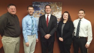Aaron Thomas (center) of Otsego heads up Beyond IT Advisors, a division of Copeland and Buhl in the Twin Cities. He's joined by Brent Goedel, Chevy Midas, Sheila Lee and Tanner Ties (submitted). 