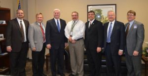 Dr. Mark Bezek (white) stands with a consortium of Minnesota school district leaders that recently met with U.S. Rep. Tom Emmer (to left of Bezek) earlier this year. Bezek announced he's stepping down from ISD 728 in Elk River effective Aug. 1. 