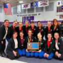 The Knights gymnastics team poses with the Section 5 Class AA title. They placed fifth at state.