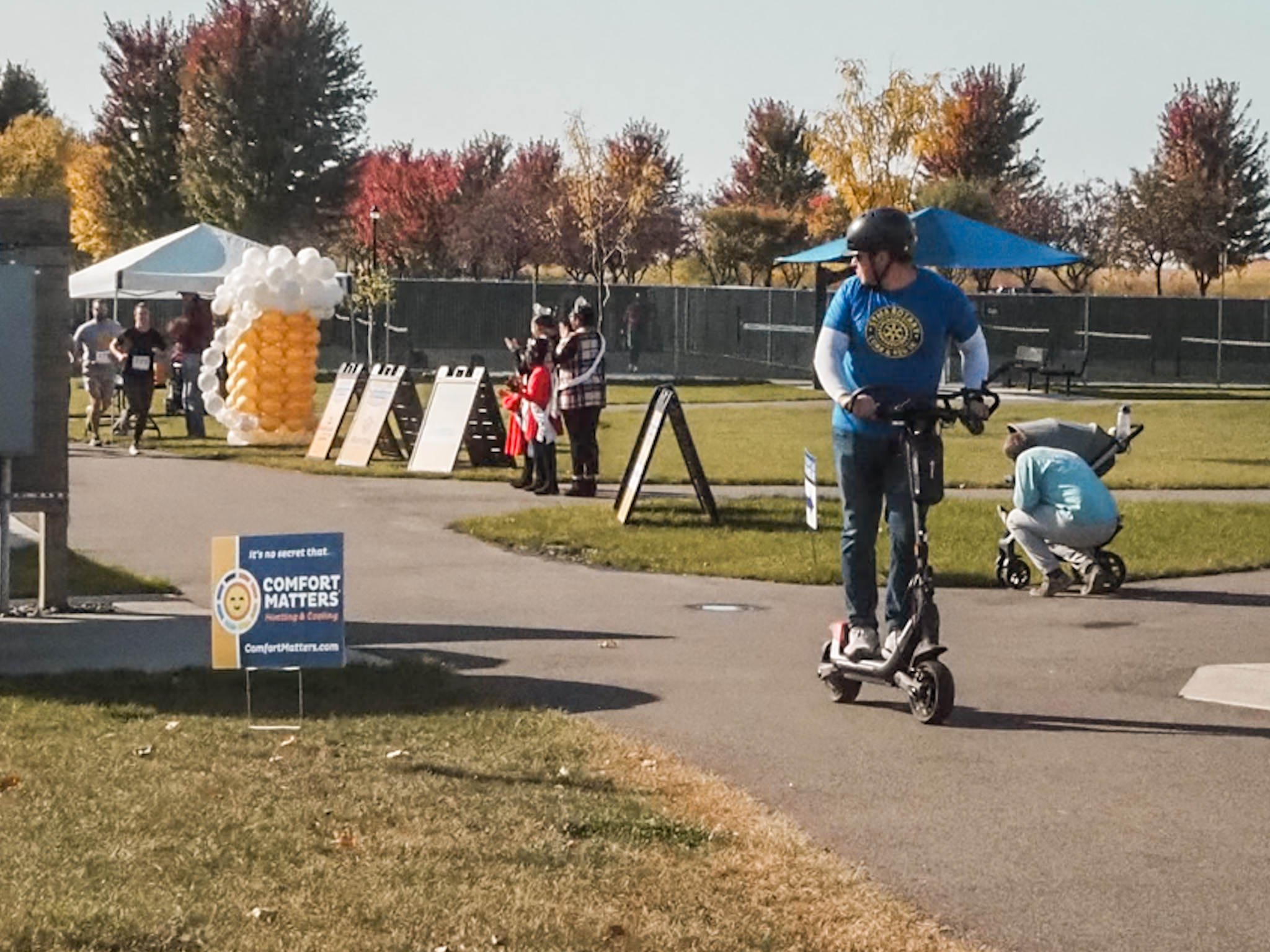 Rotary volunteers lead and cheer runners - along with Albertville Royalty - through the 5K course