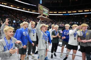 Wrestlers with trophy